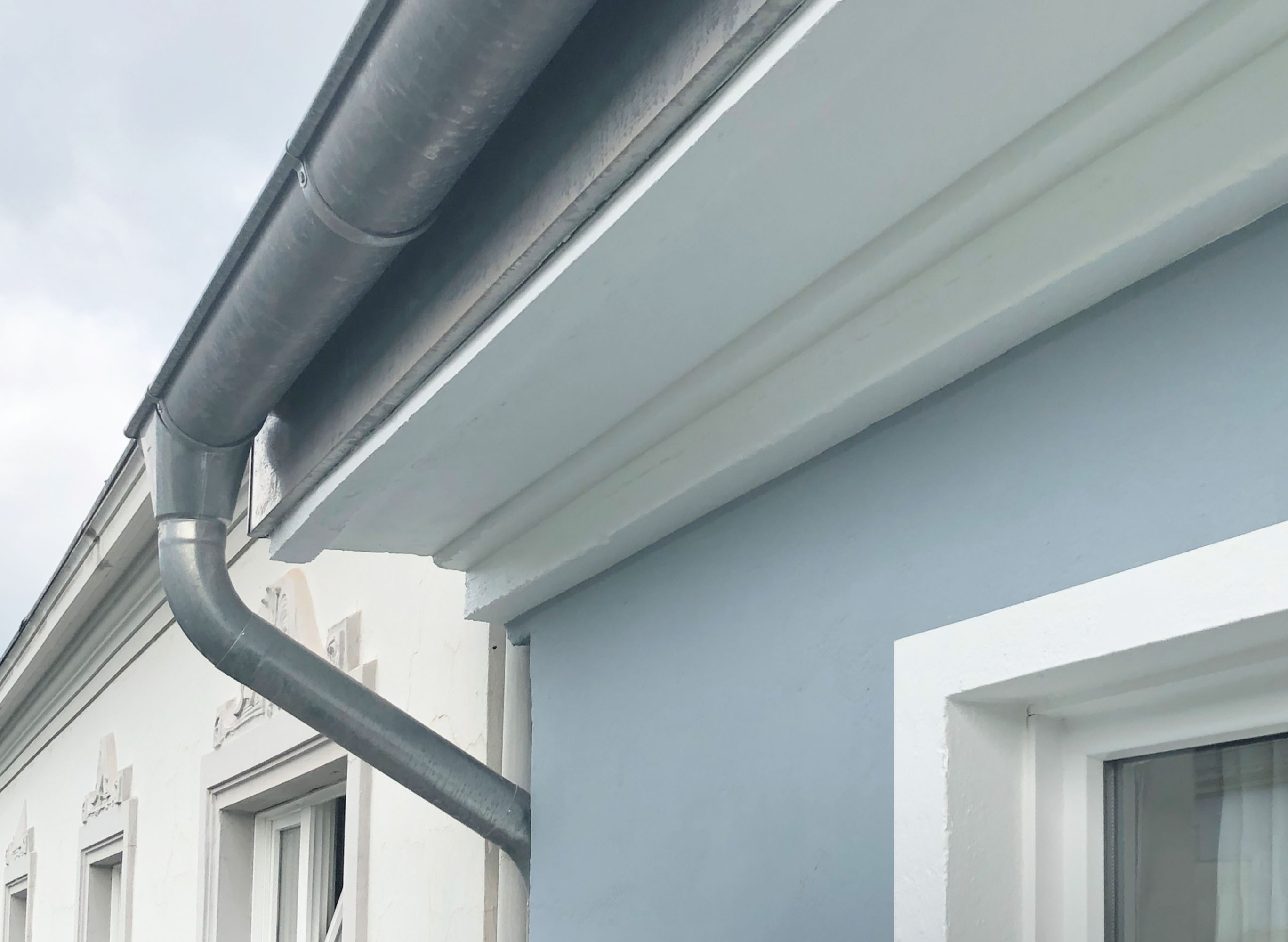 Fassaden- und energetische Dachsanierung denkmalgeschütztes Mehrfamilienhaus Hamburg Eimsbüttel